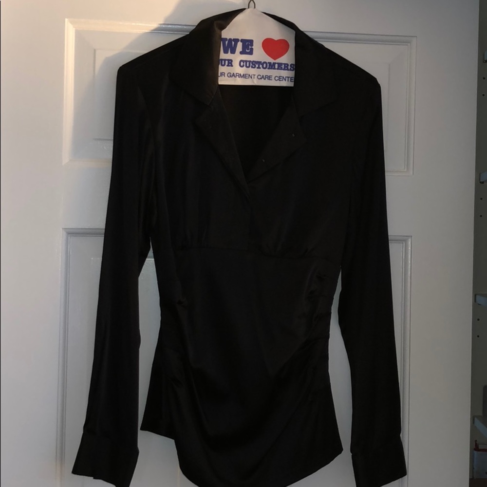 Black silk stretch long sleeve side zip blouse.